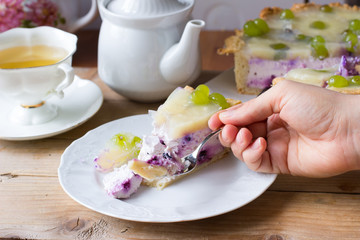Homemade cheesecake with blueberries, pineapple, grapes and jelly. Russian quark cake
