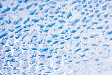 Water drops on glass for background.