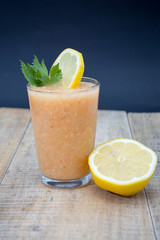 Fresh lemonade with green leaves