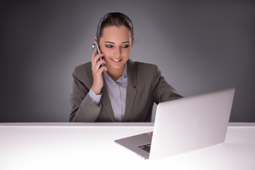 Young businesswoman working with laptop in business concept