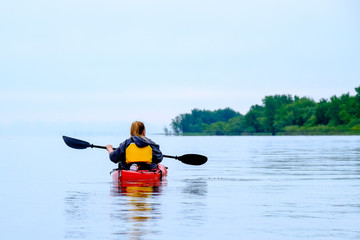 Fototapeta na wymiar Kayaking on the river