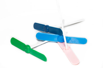 Blades propeller toy flat on white background.
