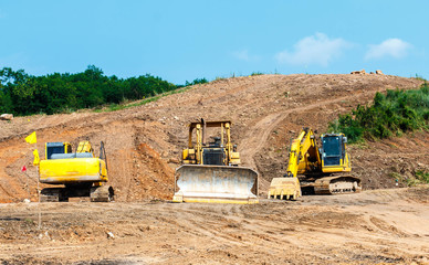 Closeup skid steer loader excavator at road construction work