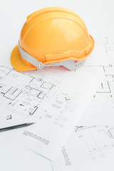 Architects workplace - architectural tools, blueprints, helmet, measuring tape, Construction concept. Engineering tools. Top view
