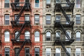Fotobehang Old Brick Apartment Buildings in Manhattan, New York City © deberarr