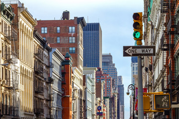 Manhattan Buildings Along an Avenue in SOHO, New York City - obrazy, fototapety, plakaty