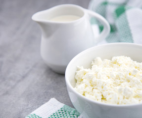 Organic Sour cream and Cottage Cheese in a white ceramic bowl on