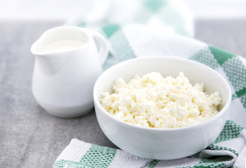 Organic Sour cream and Cottage Cheese in a white ceramic bowl on