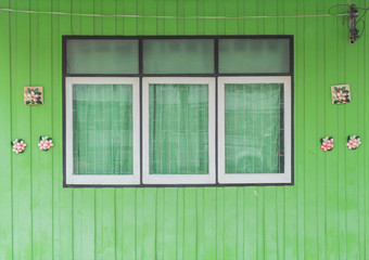 old window on wood wall