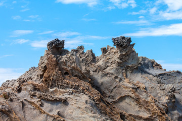 Dueling dragons rock formation emerging from landscape, Corona Del Mar beach, Newport Beach California