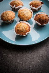 Homemade Banana cake on blue plate and dark background
