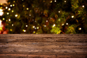 Christmas tree. Blurred christmas background, lights hanging in a pine tree - vintage color tone