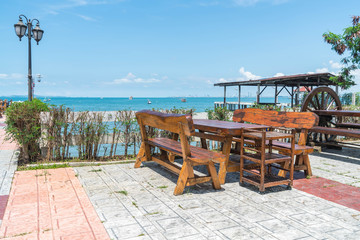 chair and table at terrace restaurant with sea view
