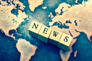 NEWS on grunge world map