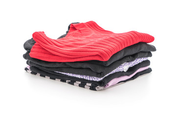 stacks of clothing on white