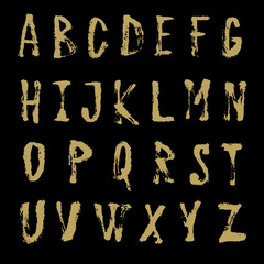 Hand written font with marker and brush on black background.