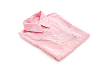 pink shirt folded on white