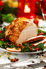 Christmas baked ham, served on the old plate. © gkrphoto