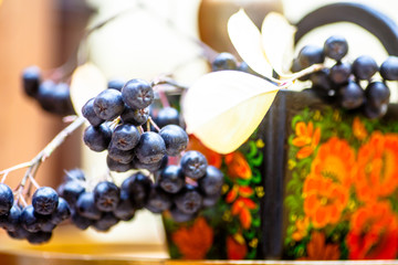 Box with Khokhloma ornament on it is a branch of black mountain