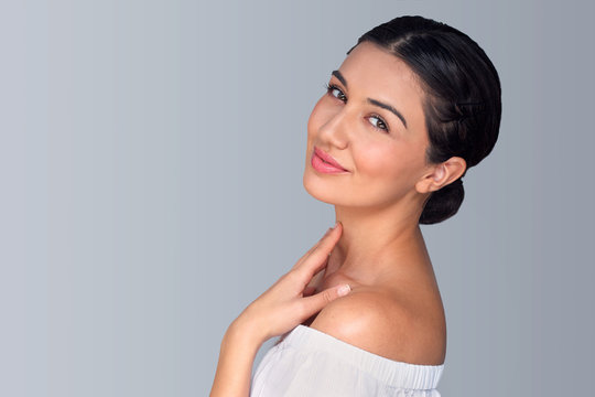 Perfect tan skin care full lips attractive mixed race female head shot natural ethnicity