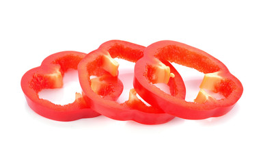 Fresh red pepper slices isolated on white