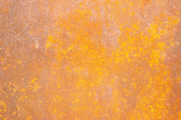 Photo of a brown grunge rusty metal texture background. Gold rust background.