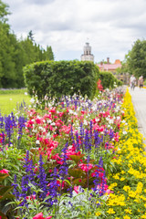 background landscape view of the bright colorful garden and a new castle in Sigulda, near Riga, Latvia