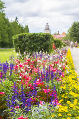 background landscape view of the bright colorful garden and a new castle in Sigulda, near Riga,...