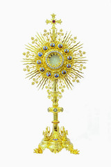 Old gold monstrance Jesus body on white background