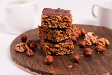 raw vegan dates oats peanut butter bars with chocolate frosting