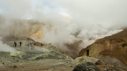 Climbing to active volcano Mutnovsky on Kamchatka.