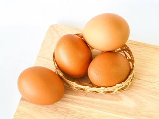 Place the eggs in a small basket