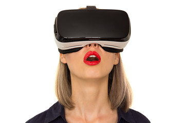 wondering young woman using vr glasses