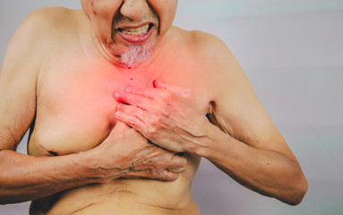 acute pain possible heart attack, senior man is clutching he che