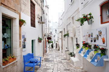 Apulia, Italy - alley of the white city Ostuni - obrazy, fototapety, plakaty