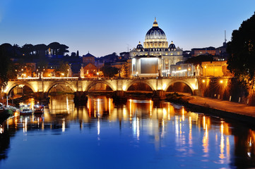 Fototapeta na wymiar Rome, Italy - view of the Tiber river and St. Peter's Basilica at night