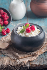 Fresh homemade cottage cheese with raspberries