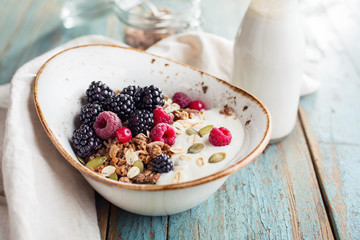 Delicious granola with blackberry, close-up