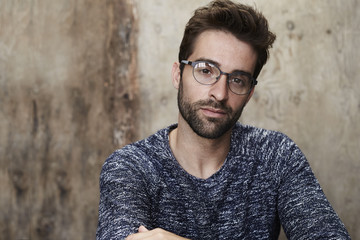 Guy in glasses wearing sweater, portrait