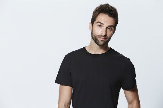 Black t-shirt guy in studio, portrait