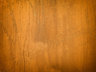 Grunge concrete texture background , orange wall.