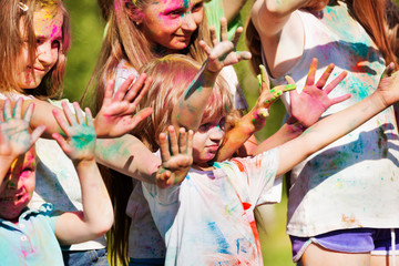Children painted in the colors of Holi festival