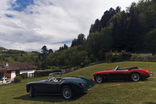 Fototapeta expensive vintage sports cars on the background of nature