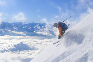 Naklejka na ściany i meble spektakulär skifahren hoch über den Wolken