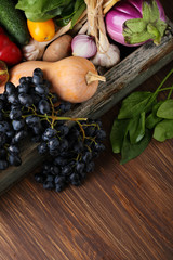 Fresh vegetables wood background