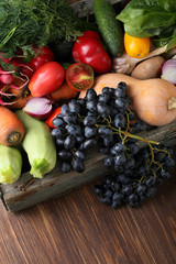 Fresh organic vegetables wood background