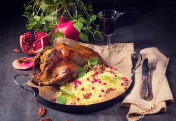 Duck with millet and pomegranate