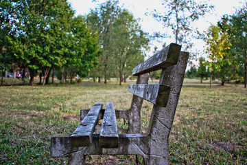 An old wooden bench at the park