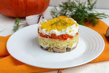 Easy Diet salad layers in the shape of a circle (tuna in oil, boiled potatoes, carrots, eggs). Alternative Slavonic traditional dish 