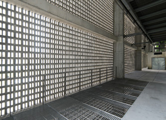 Empty gray concrete corridor